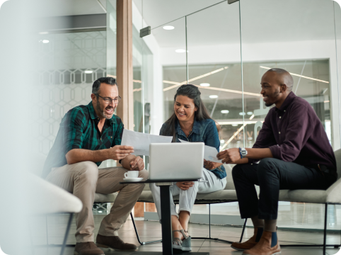 Two men and a woman having a meeting in an office