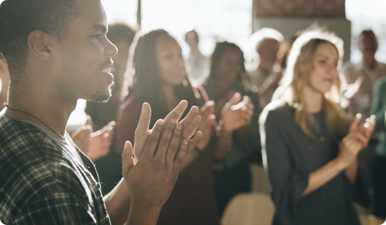 Group of people clapping