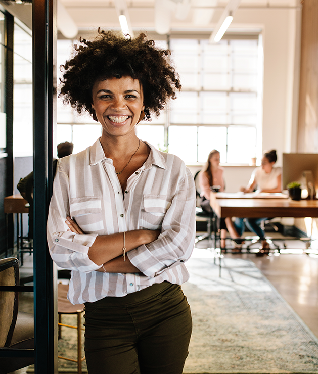 Portrait of happy woman in office