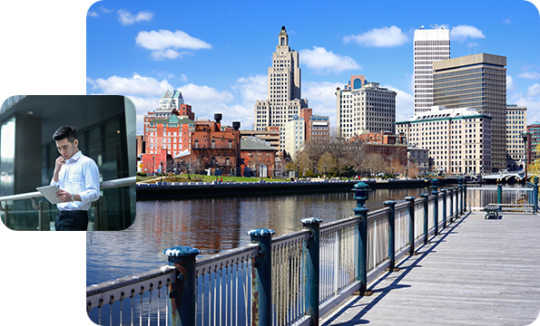 Right: Picture of Providence, RI, Left: Businessman outside building looking at tablet