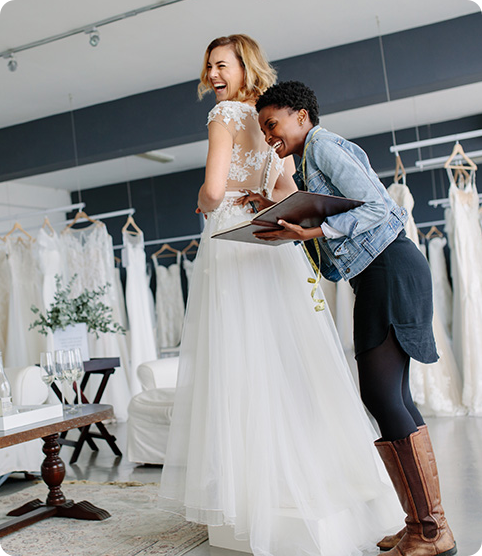 Woman trying on a wedding dress