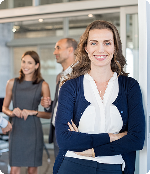 Portrait of business woman standing in doorway of office