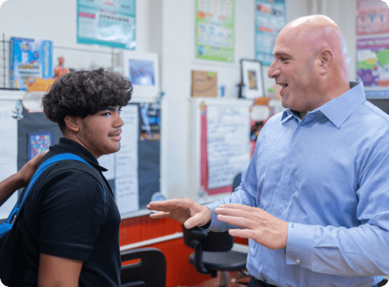 liguori-academy-1 Liguori Academy - student and teacher talking