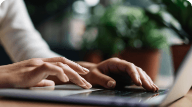 Person typing on laptop